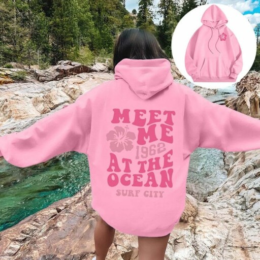 Pink hoodie with floral design on chest