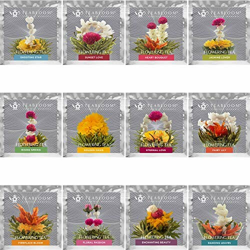 Assorted blooming tea packages with various floral designs.