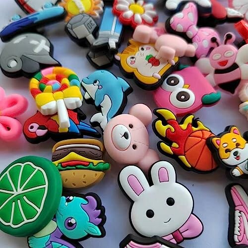 A variety of colorful, cute charms including animals, food, and objects.