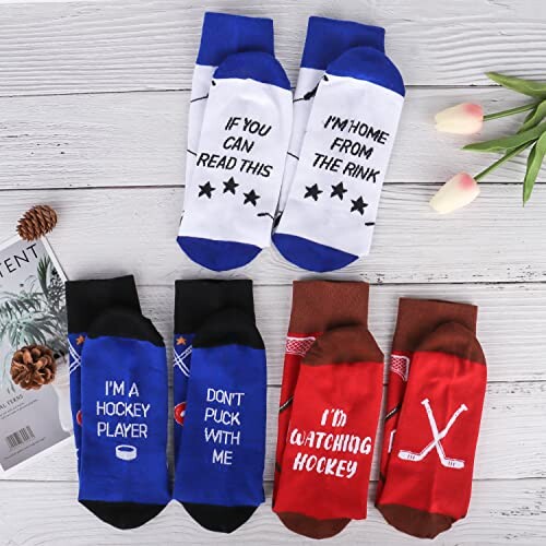 Various pairs of hockey-themed socks with humorous text. Perfect for golfing and fishing enthusiasts