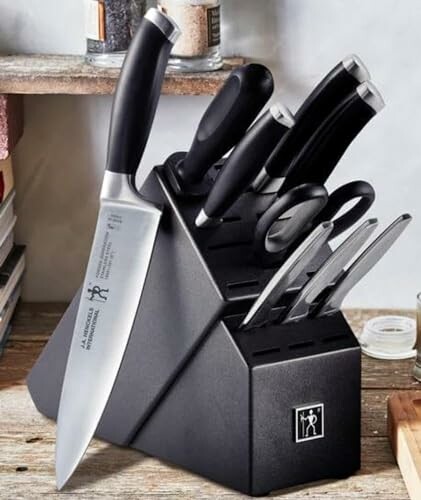 Black knife block with various kitchen knives