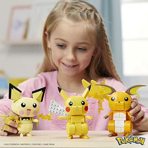 Child playing with Pokémon building toys, including Pikachu, Raichu, and Pichu.