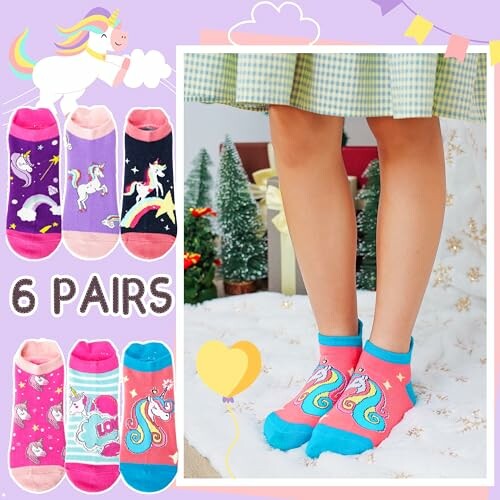 Colorful unicorn-themed socks in six pairs next to legs wearing pink and blue unicorn socks.